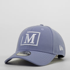 Purple baseball cap with a white logo on a gray background