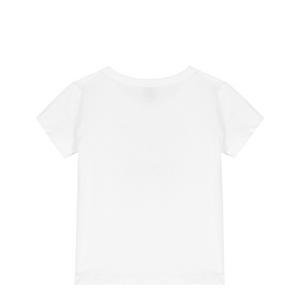 Plain white t-shirt on a light beige background