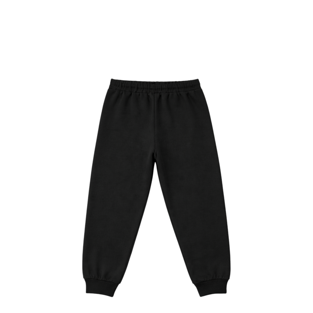 Black jogger pants with red stripes and Moschino logo on a white background